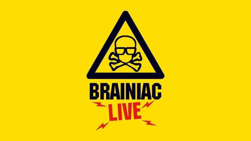 A black and yellow logo featuring a skull and crossbones with glasses.