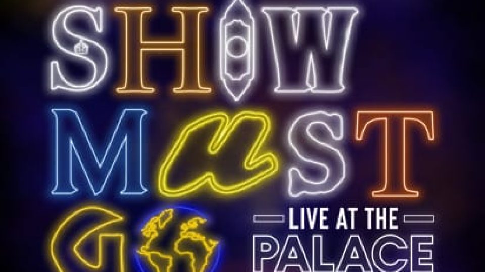 Colourful neon sign displaying 'The Show Must Go On!' at the Palace Theatre, November 2020.