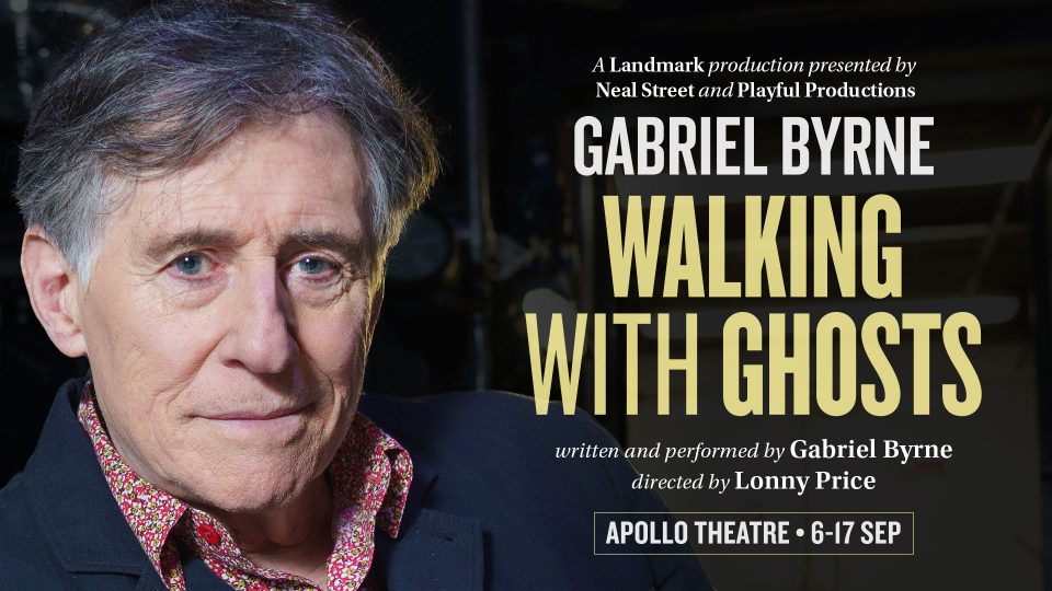 Close-up of Gabriel Byrne, wearing a patterned shirt, promoting 'Walking With Ghosts'.