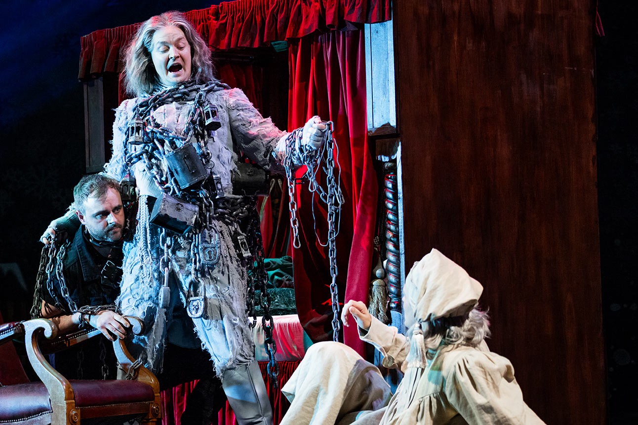 Chris Leask, Greg Tannahill, and Daniel Fraser stand smiling against a plain grey background.