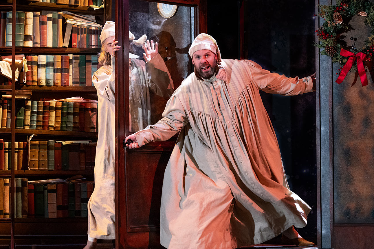 Daniel Fraser and Henry Lewis stand side by side, smiling against a plain grey background.