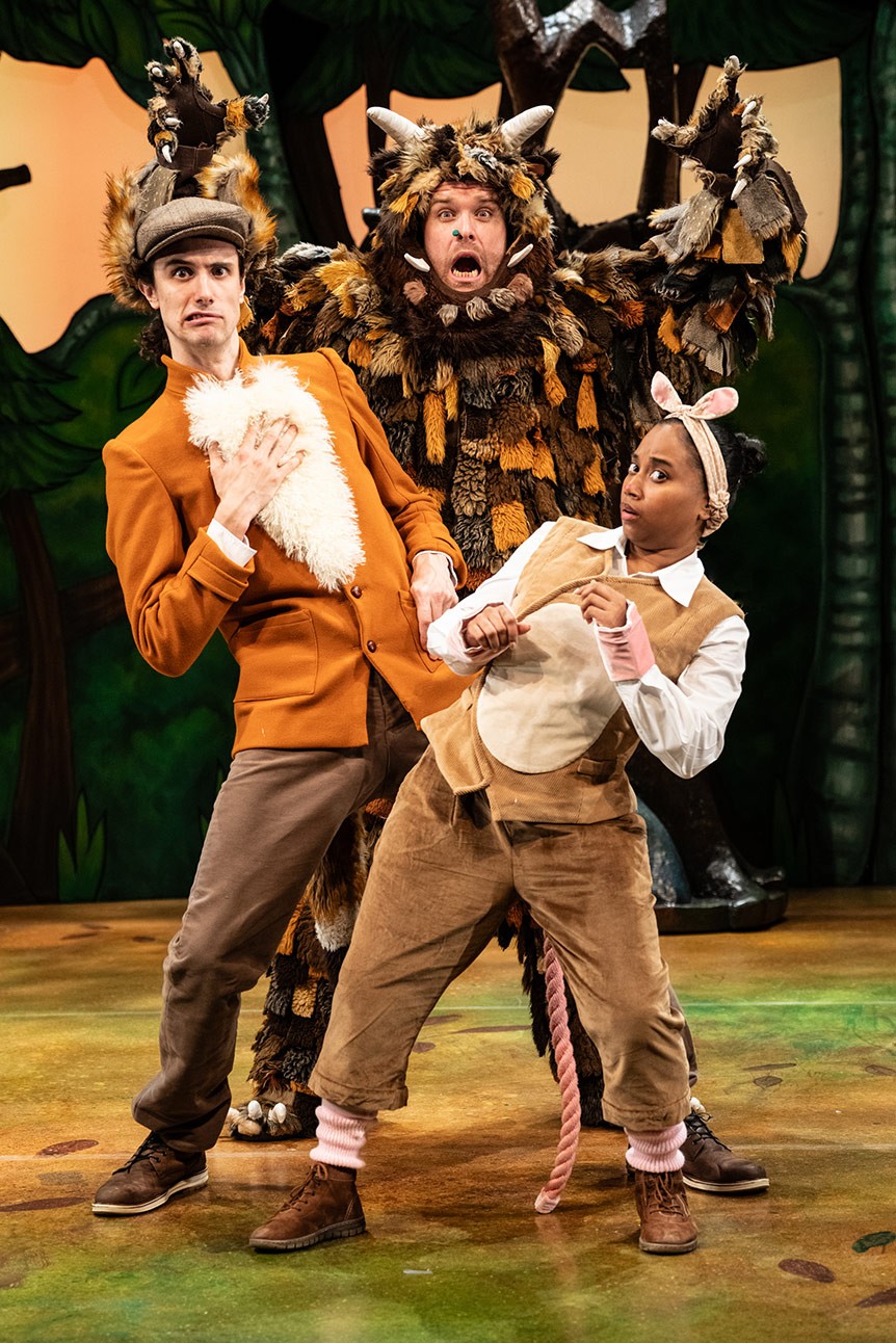 Jordan Cottle, Niall Hemingway, and Rianna Kellman in animal costumes performing on stage in "The Gruffalo".