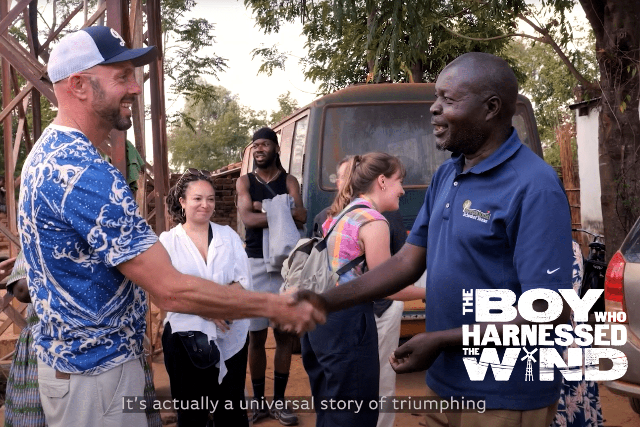 William shakes hand with the creatives.