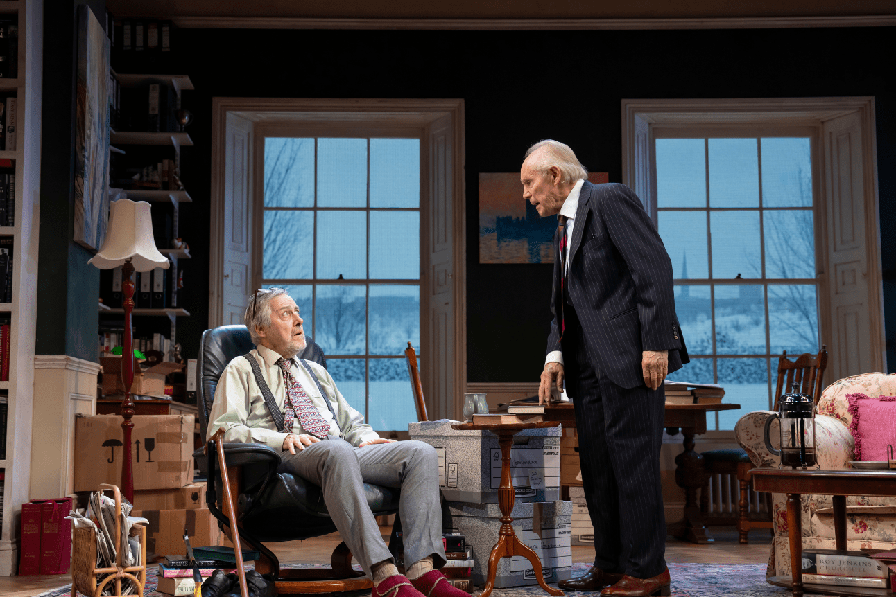 Sir Humphrey speaks sternly to Jim while in his study.