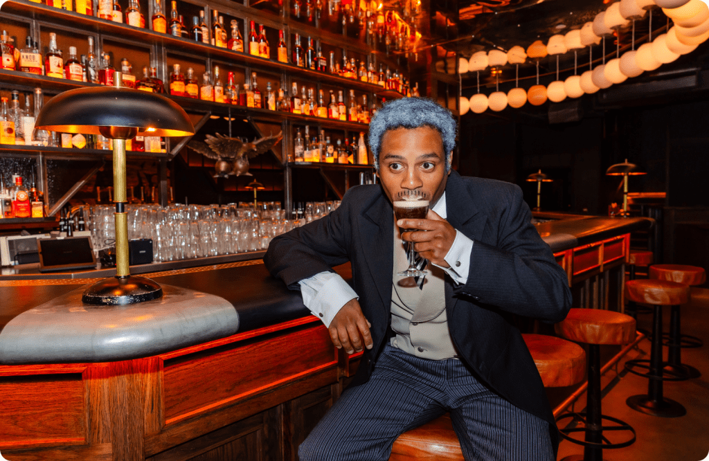 Dennis sips his cocktail while sat at the bar in STEREO