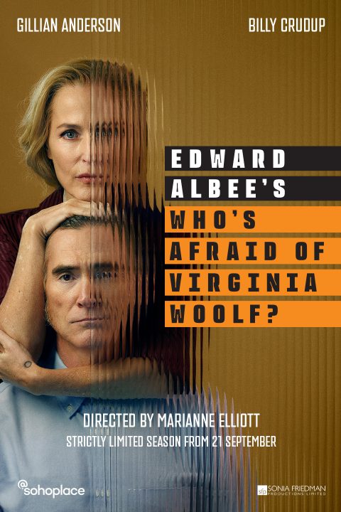 A woman in a red dress stands on stage, holding a microphone, with a spotlight on her.