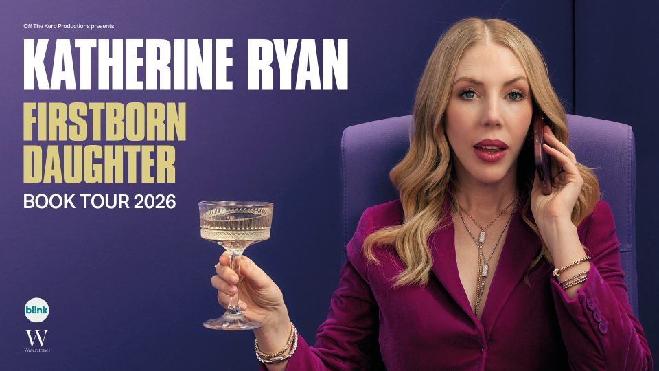 Katherine Ryan holds a champagne glass, wearing a purple blazer; text reads "Katherine Ryan - First Born Daughter".