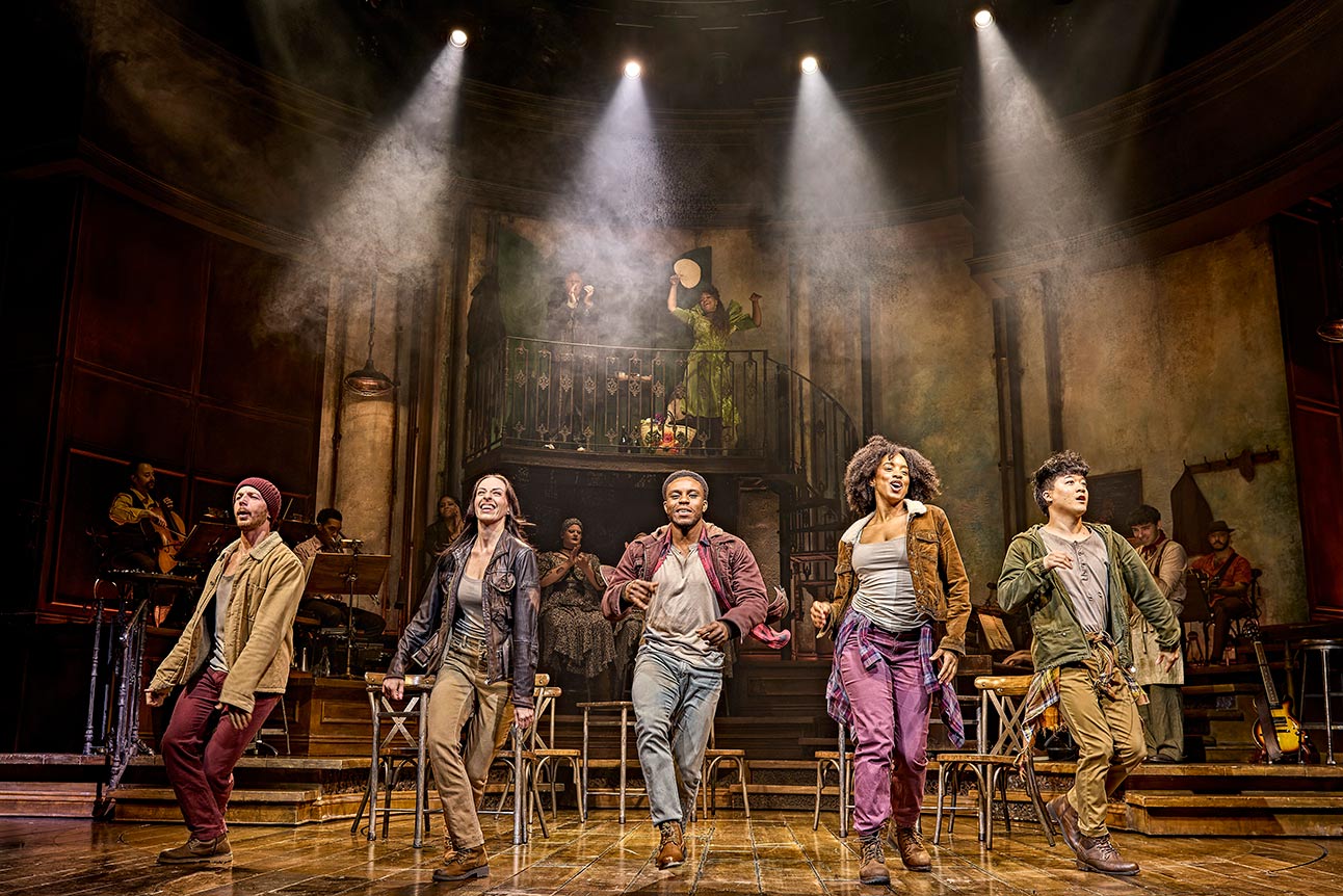 Ollie Bingham, Michelle Andrews, Femi Akinfolarin, Gabriela Benedetti, Sebastian Lim-Seet performing on stage in Hadestown.